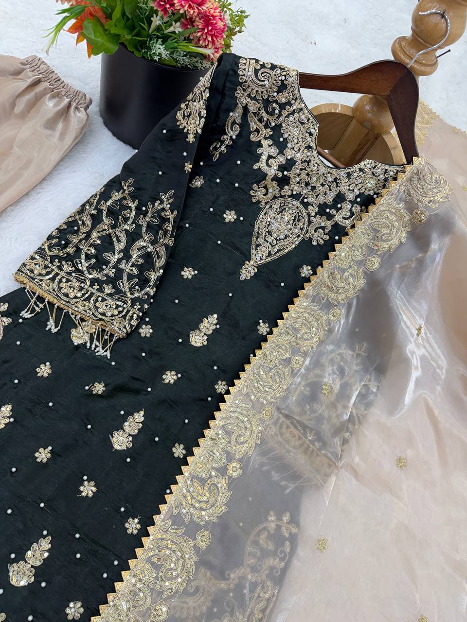 V-neckline with ornate embroidered panel