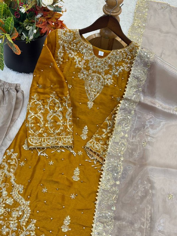 V-neckline with ornate embroidered panel